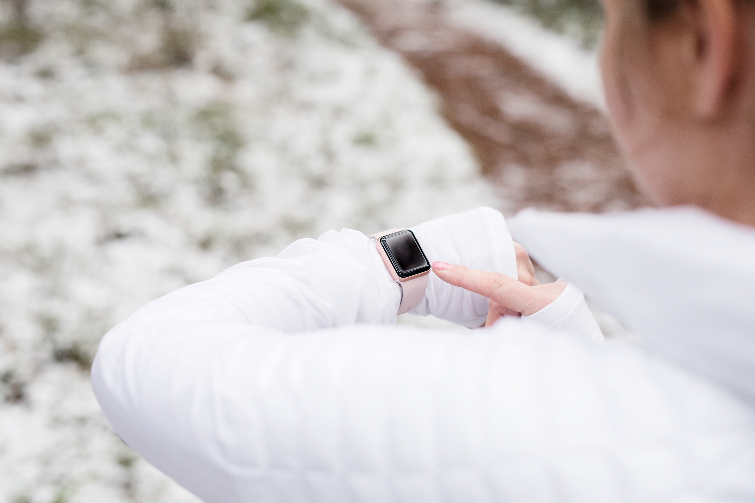 Woman Using Wearable Tech during Fitness Activities